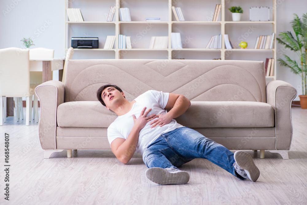 Man suffering from sick stomach and vomiting Man suffering from sick stomach and vomiting