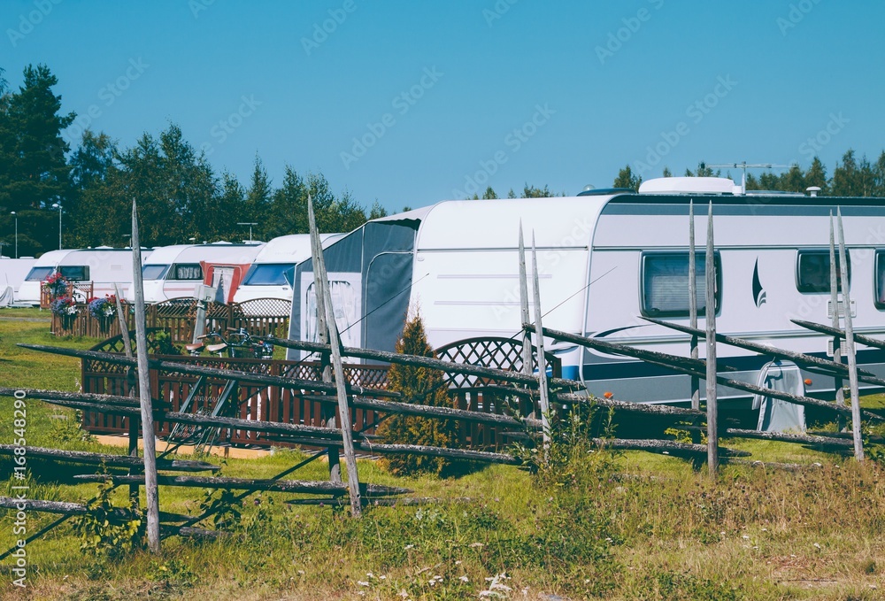 Camping life with caravans in nature park