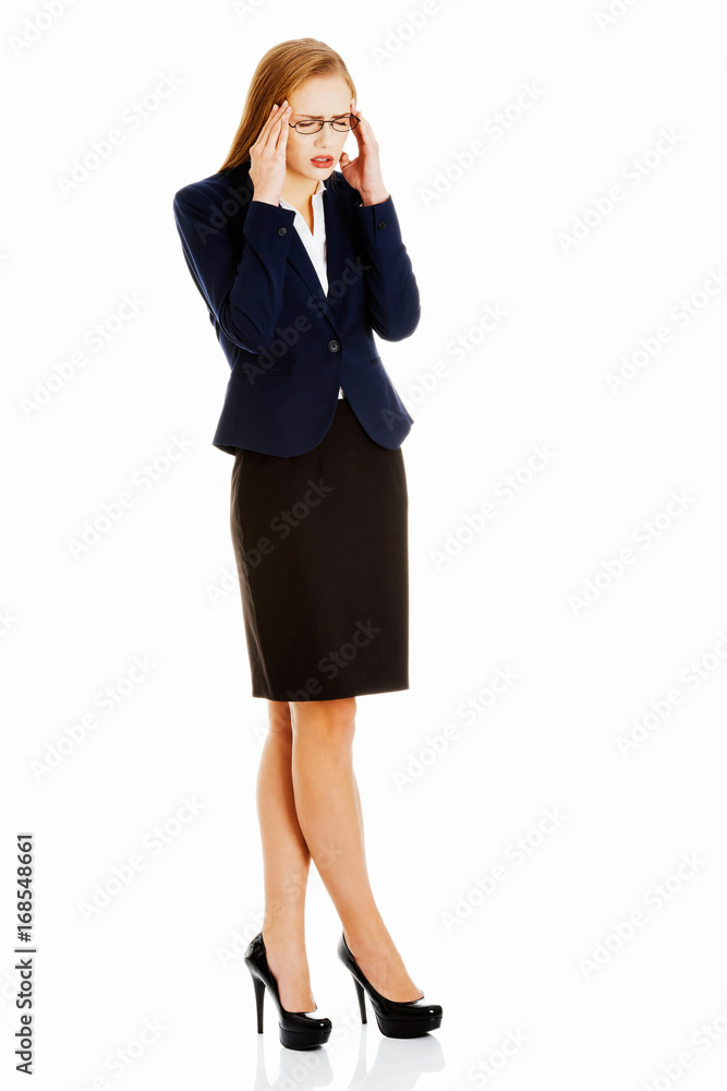 Beautiful business woman is having a headache. Beautiful business woman is having a headache.