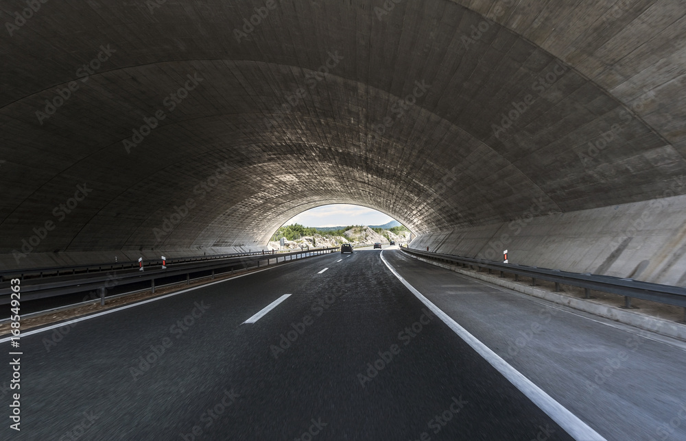 Road in an underground tunnel. Road in an underground tunnel.