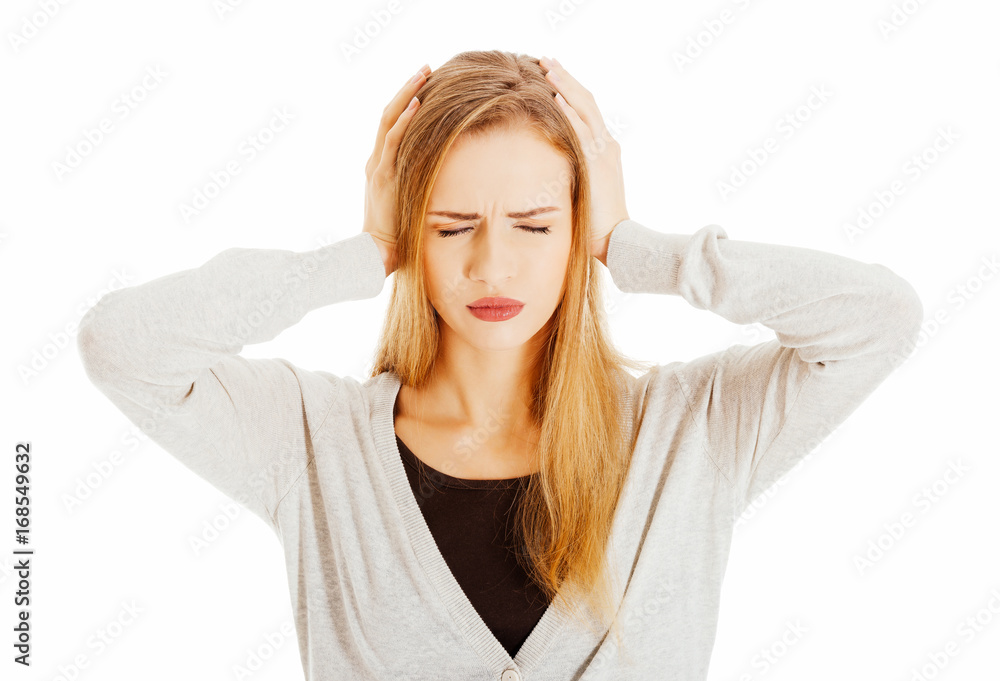 Beautiful casual woman is covering her ears. Beautiful casual woman is covering her ears.