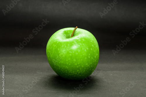 Single green apple