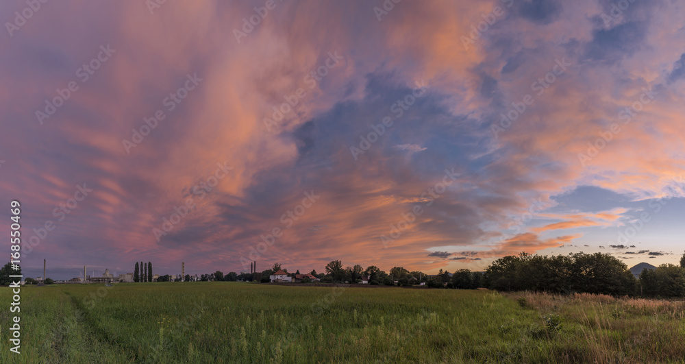 Color cloud sky after sunset near Lovosice town