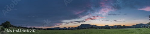 Color cloud sky after sunset near Lovosice town photo