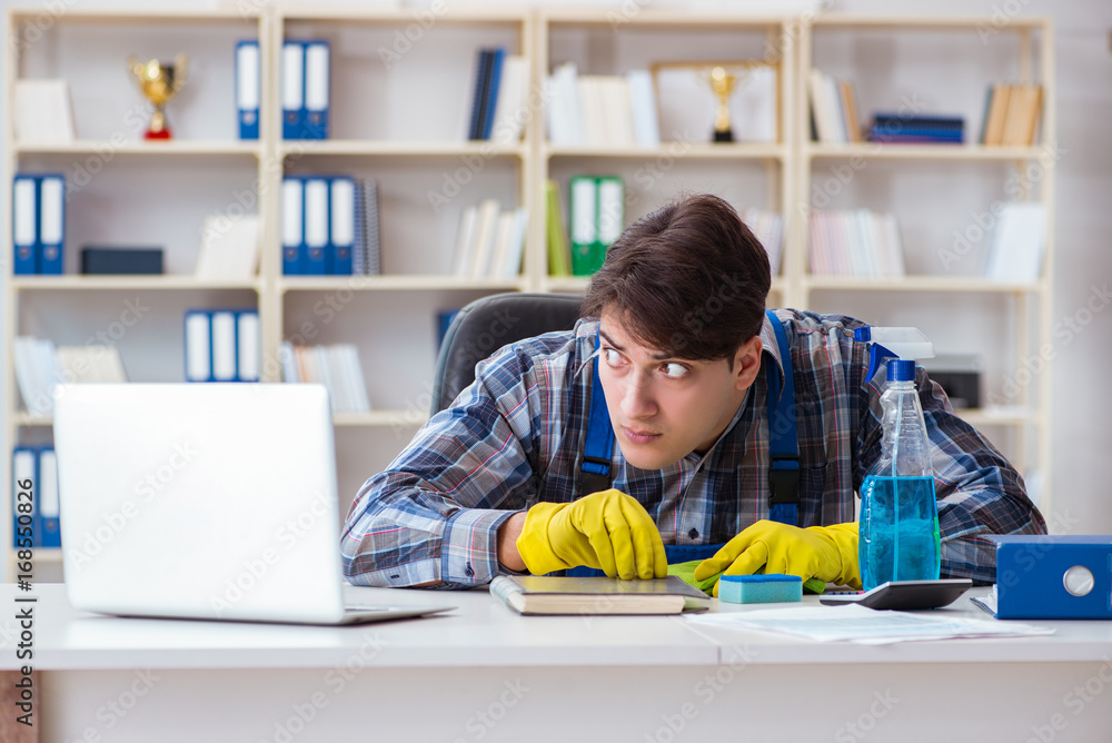 Man cleaner stealing confidential documents Man cleaner stealing confidential documents