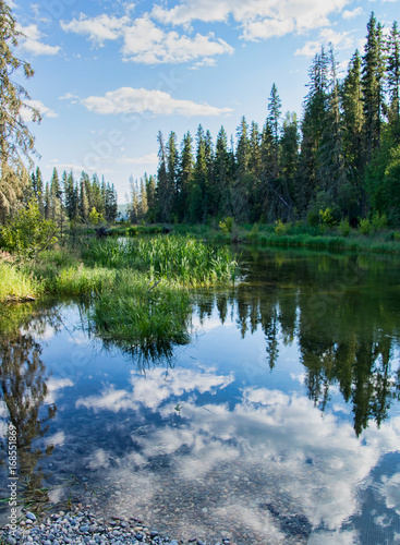Tranquil late afternoon at the trailhead to the hiking trail to Grey Owl's cabin at the mouth of Waskesiu lake in Prince Albert National Park in Saskatchewan, Canada. 