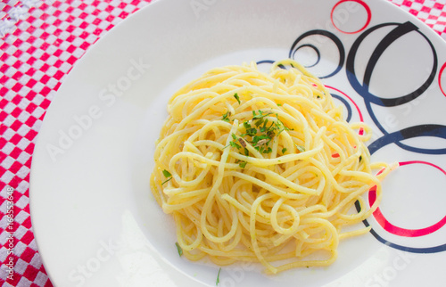 Spaghetti with chive on a plate close