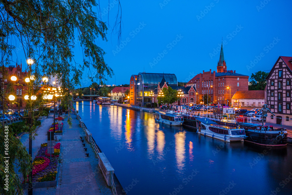 Old Town and granaries by the Brda River at night. Bydgoszcz. Poland
