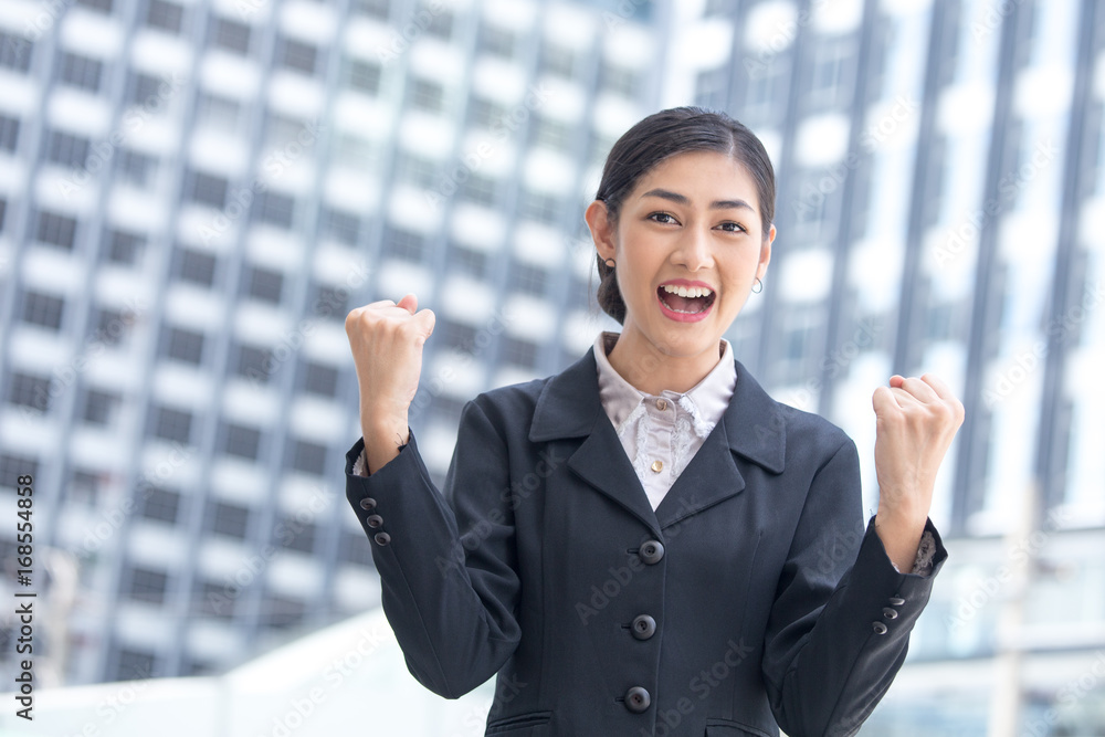 Young Beautiful Business Woman standing in City with Success feeling for Work. Young Business Woman have Confident for Work with Success concept. Asian Woman Success for Work. Young Beautiful Business Woman standing in City with Success feeling for Work. Young Business Woman have Confident for Work with Success concept. Asian Woman Success for Work.