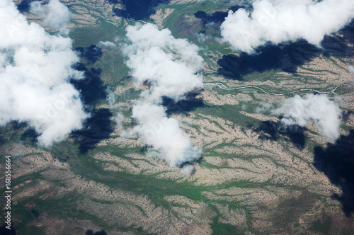 aerial view of the green plant along valley in desert in spring