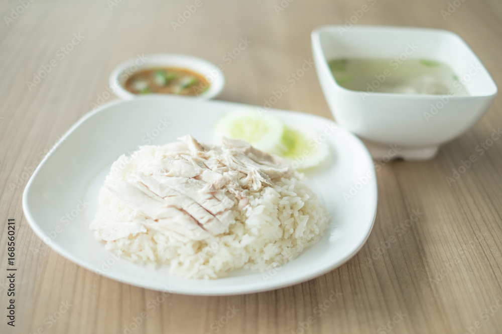 Asian well known food a Hainanese Chicken Rice or Asian gourmet steamed chicken with rice Asian well known food a Hainanese Chicken Rice or Asian gourmet steamed chicken with rice
