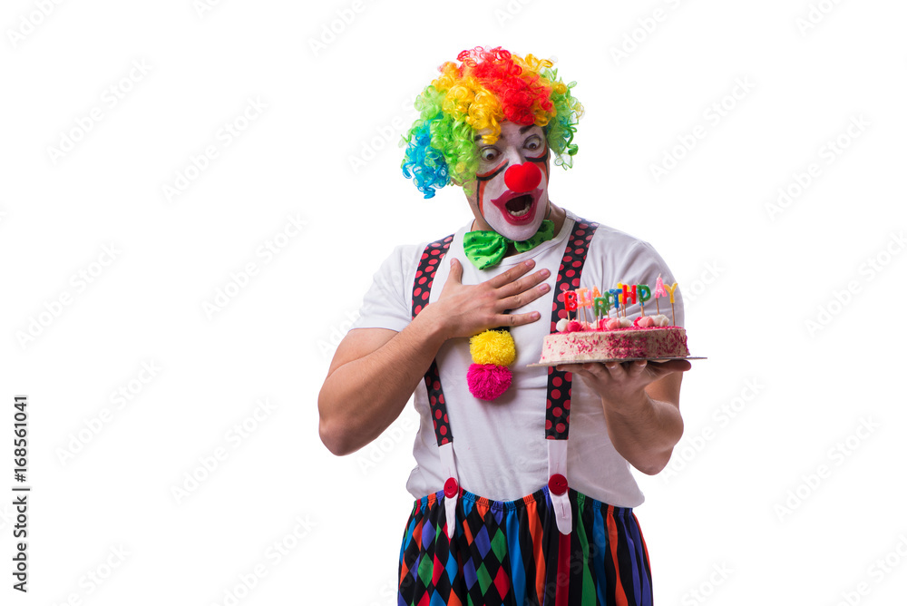 Funny clown with a birthday cake isolated on white background Funny clown with a birthday cake isolated on white background