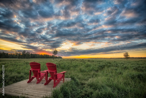 Red Chairs Before Beautiful Sunrise in Elk Island Park photo