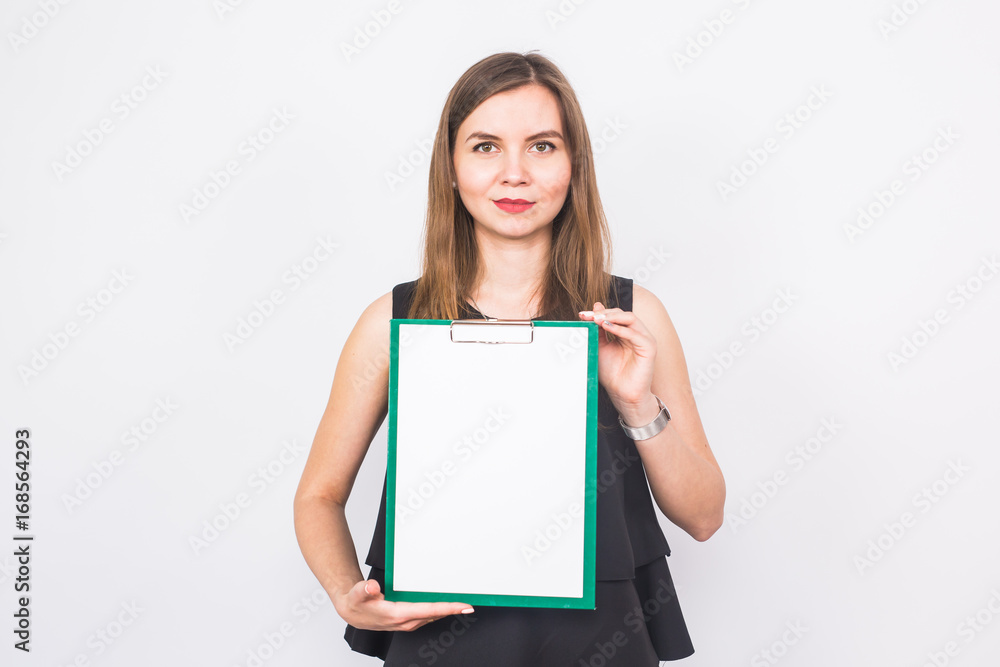 Portrait of young business woman holding a blank banner. image on a white studio background. business and lifestyle concept. Portrait of young business woman holding a blank banner. image on a white studio background. business and lifestyle concept.