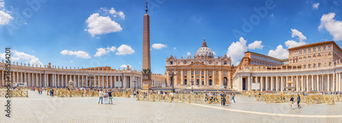 St. Peter's Square and St. Peter's Basilica, Vatican City in the day time, tourist around. Italy.
