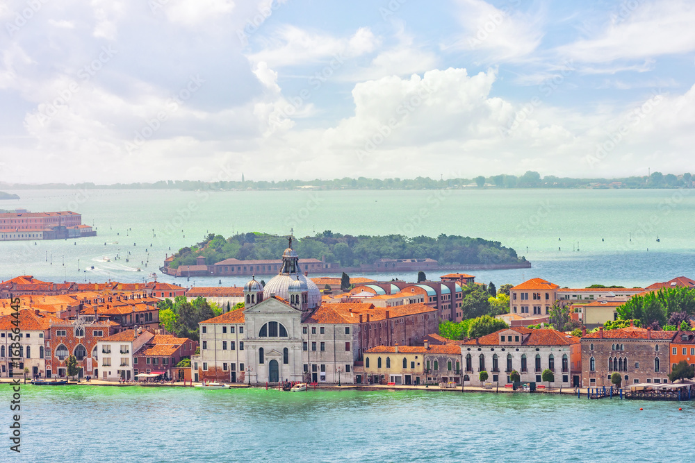 Panoramic view of Venice from the Campanile tower Island of Giudecca and Redentore Church ( Chiesa del Santissimo Redentore). Italy.