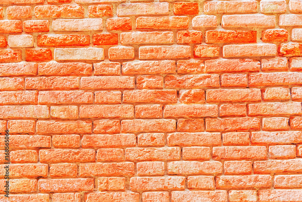 Obraz premium Texture of a brick wall made from an old red bricks. Picture taken in Venice.