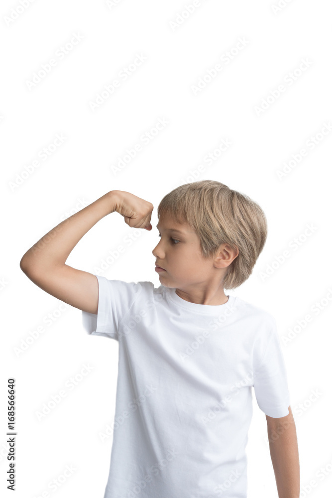 Boy showing his hand biceps muscles strength, isolated on white background. Boy showing his hand biceps muscles strength, isolated on white background.
