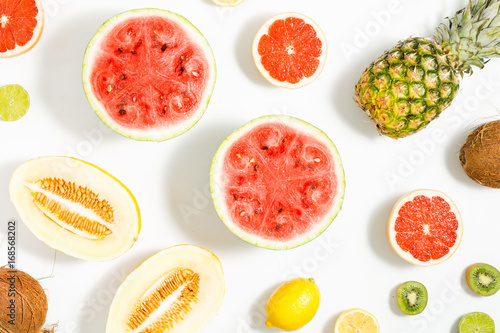 Fototapeta Naklejka Na Ścianę i Meble -  Watermelon, coconut, melon, grapefruit, lime, lemon and pineapple. Summer pattern