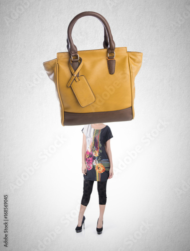 Woman or handbag headed girl with concept on a background.