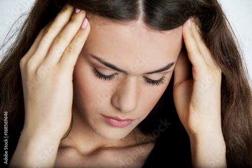 Young woman with headache.