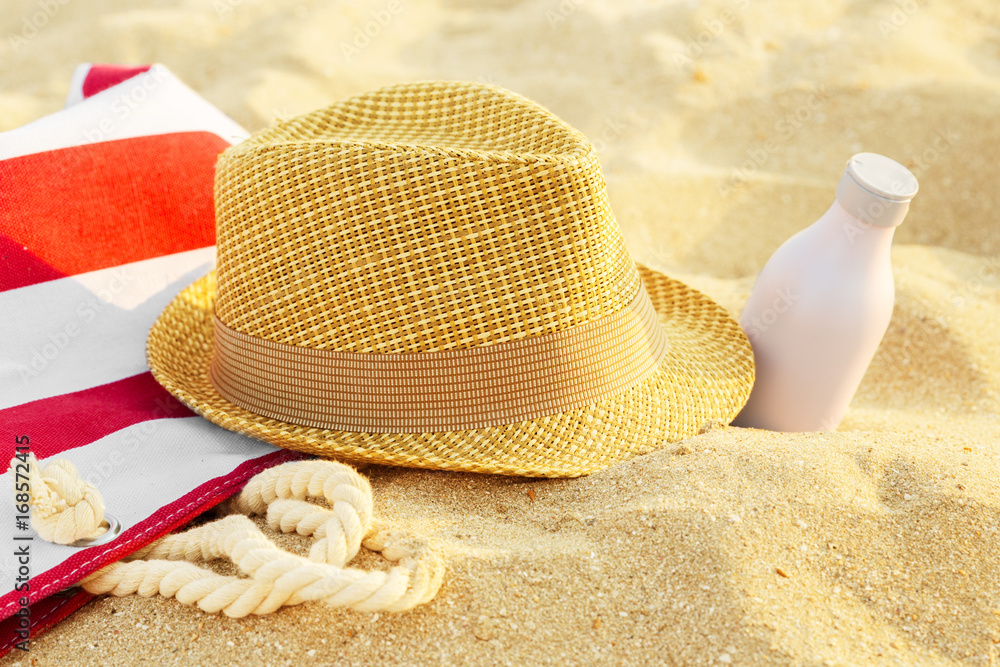 Top view of sandy beach with summer accessories Top view of sandy beach with summer accessories