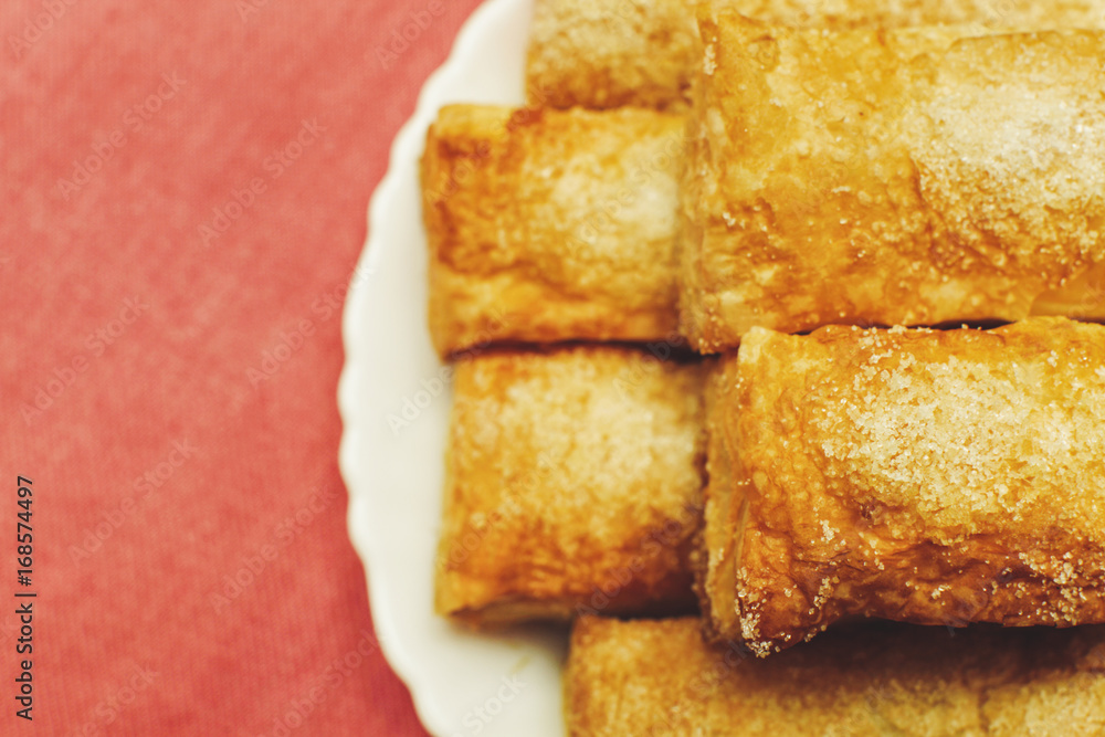 Puff pastry cakes with sugar powder close up Puff pastry cakes with sugar powder close up