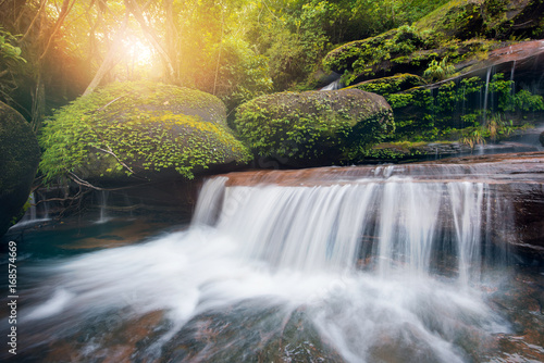 Waterfall hidden in the tropical jungle © Thongsuk