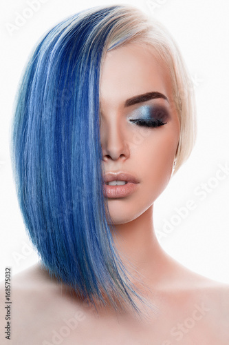 woman with blue hair and make-up photo