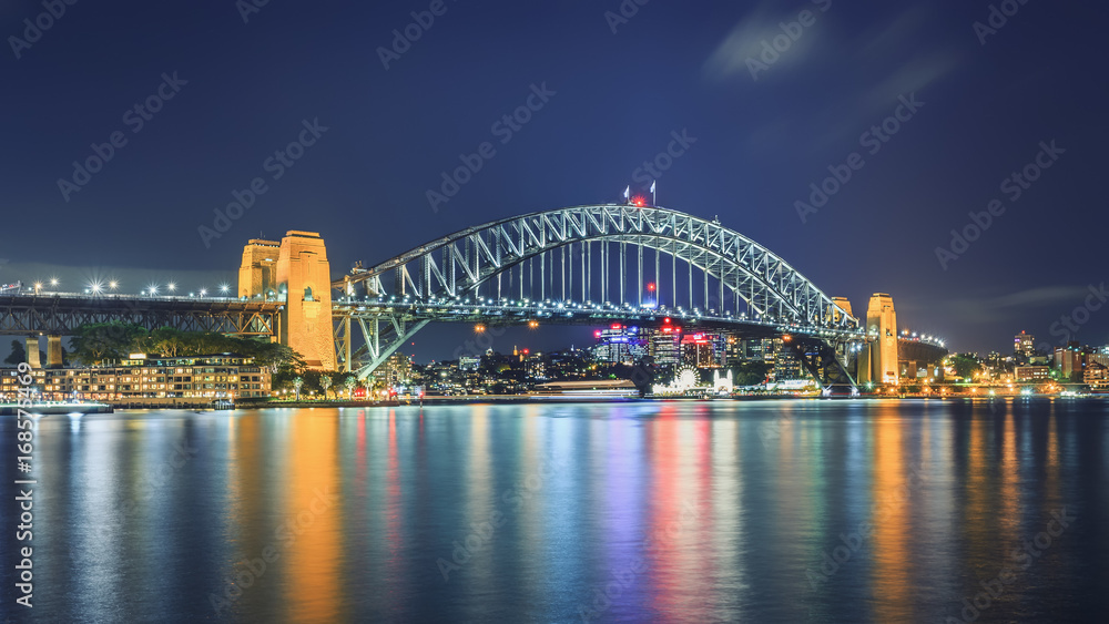 The Iconic Harbour Bridge at night from Circular Quay. Sydney Harbour Bridge is considered as the major landmark of Sydney and tourists attraction. The Iconic Harbour Bridge at night from Circular Quay. Sydney Harbour Bridge is considered as the major landmark of Sydney and tourists attraction.