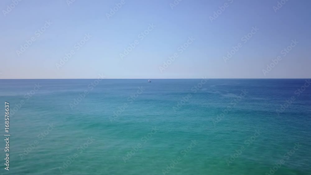 A calm winter day in Australia with gentle winds, perfect for slow sailing. A 4k video of a little sailing boat passing the Queensland coast. A calm winter day in Australia with gentle winds, perfect for slow sailing. A 4k video of a little sailing boat passing the Queensland coast.