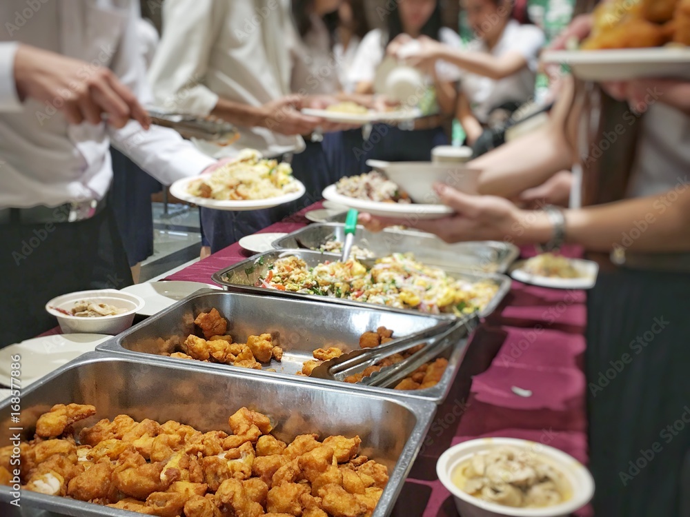 Abstract blur image of Lunch break education people and student in line wait for food meals. vintage tone colour  .Indoor catering food party concept.