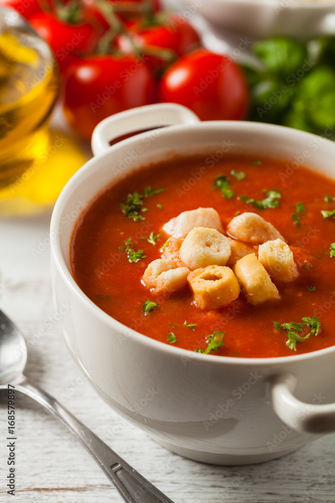 Traditional tomato soup, served with croutons. Traditional tomato soup, served with croutons.
