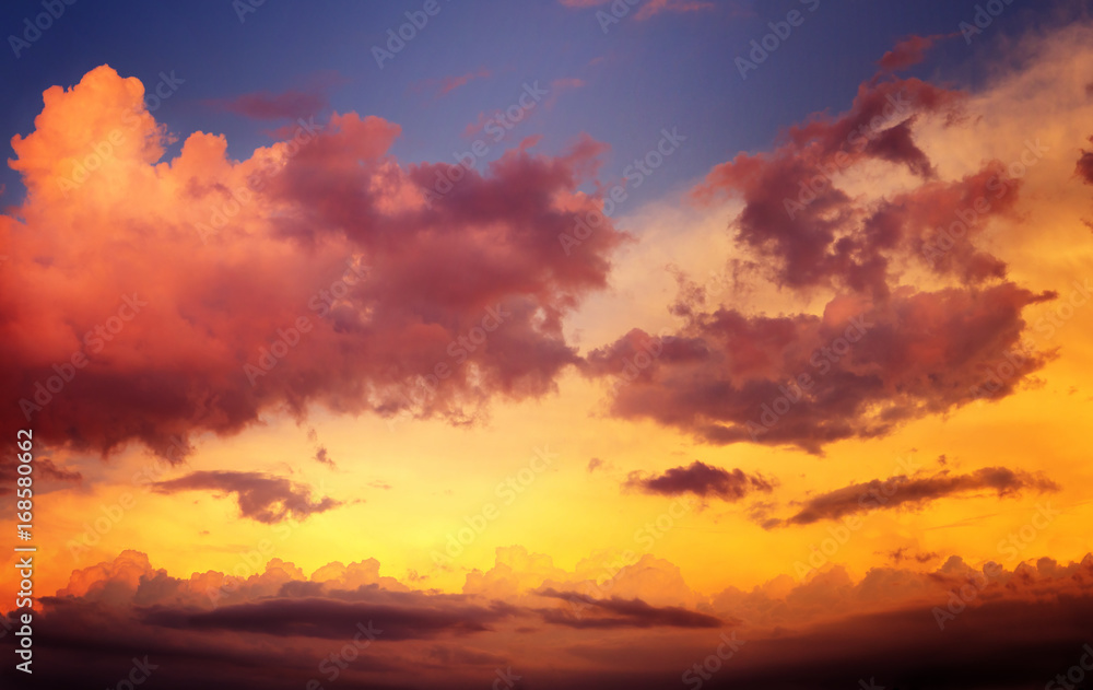 dramatic sunset sky with orange and red clouds. high resolution photo