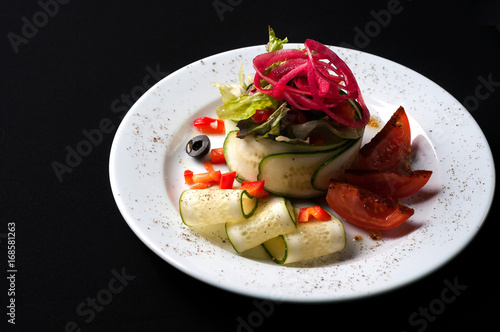 salad with fresh vegetables and butter
 photo