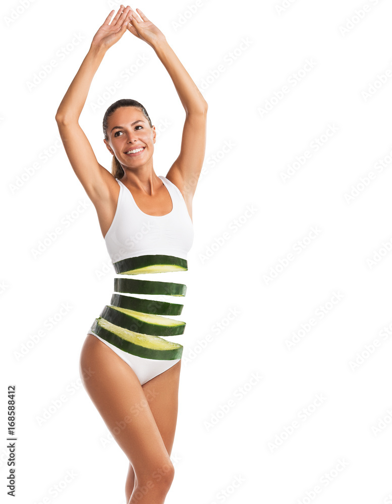 Fit woman with cucumber slices, healthy eating concept, isolated on white background Fit woman with cucumber slices, healthy eating concept, isolated on white background