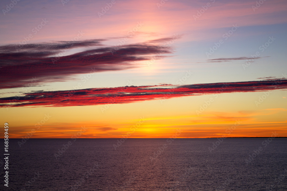 Fototapeta premium Beautiful sunset over Baltic Sea - seascape with sea horizon