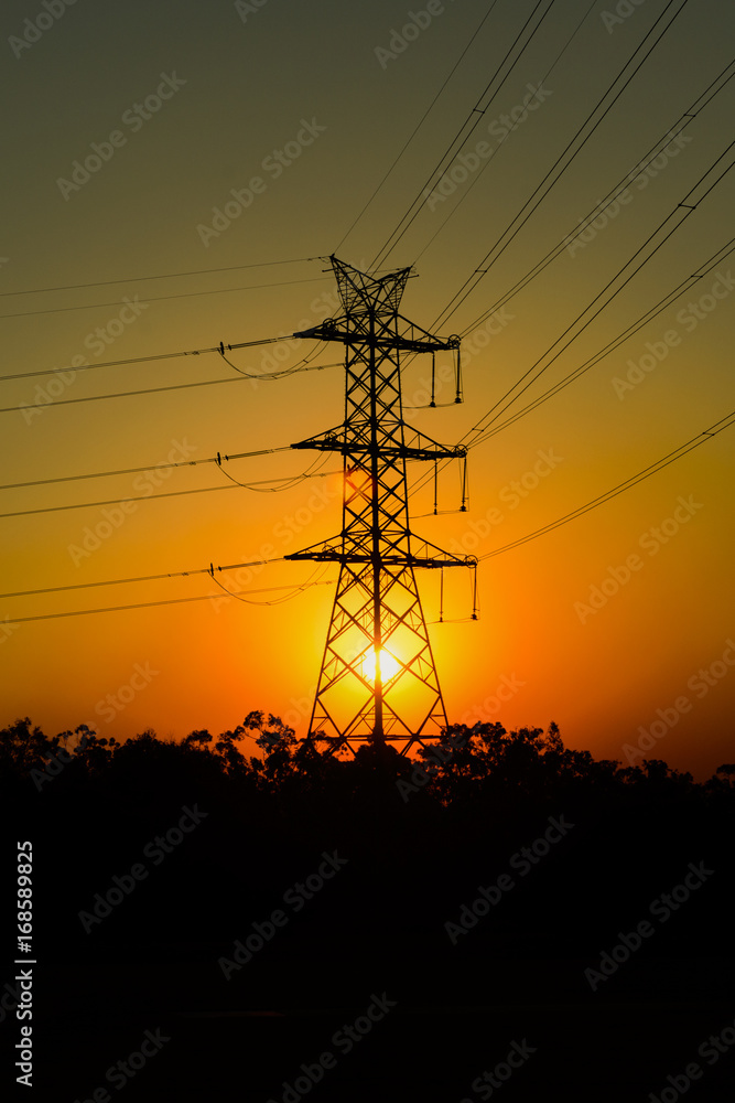 Fototapeta premium High voltage power tower at sunset in Brisbane, Queensland.