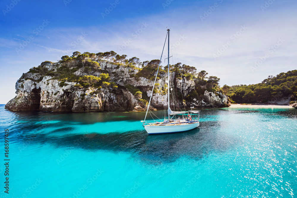 Beautiful bay with sailing boats, Mediterranean sea. Menorca island, Spain