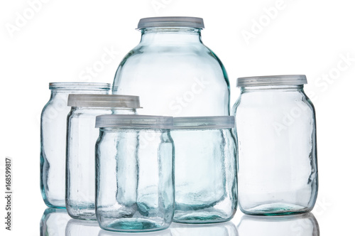 Few glass jars isolated on white background
