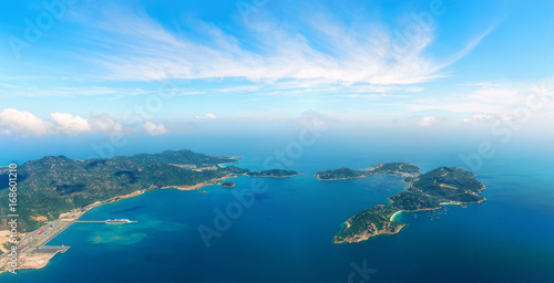 Aerial panoramic view of the sea harbor among the islands.