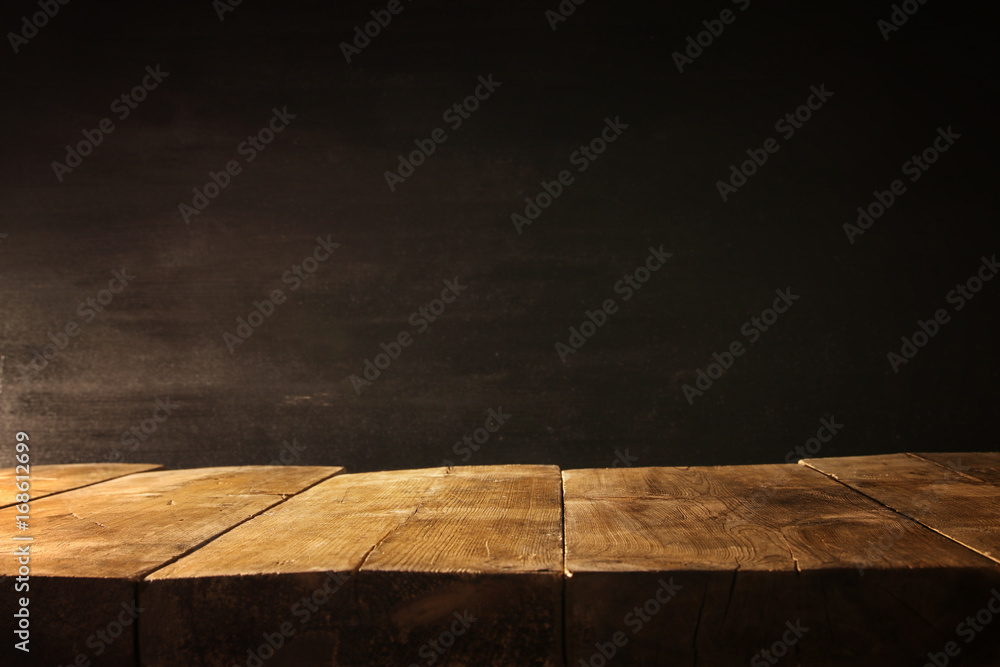 wooden table and blackboard background. Ready for product display montage