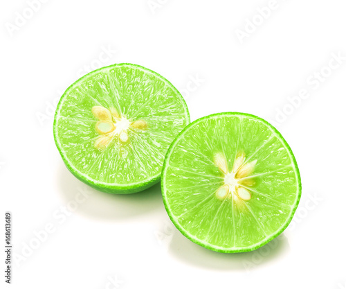fresh sliced lime with seed on the white background