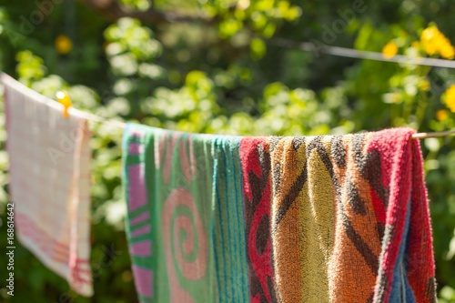 Hanging towels in the garden on a line
