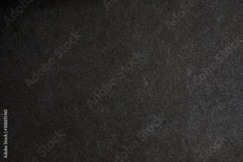close up the black paper texture background