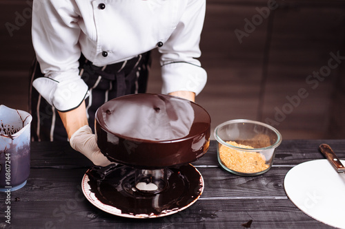 cake covered in chocolate. Mirror glaze