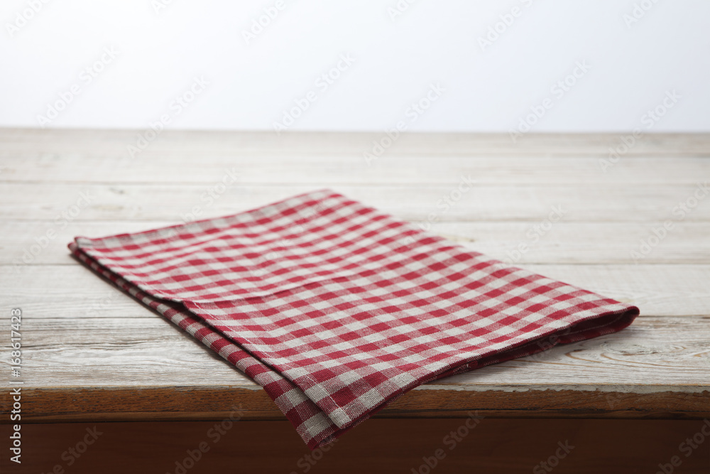 Napkin. Tablecloth tartan, checkered, dish towels on white wooden table background top view, mock up Napkin. Tablecloth tartan, checkered, dish towels on white wooden table background top view, mock up