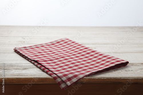 Napkin. Tablecloth tartan, checkered, dish towels on white wooden table background top view, mock up