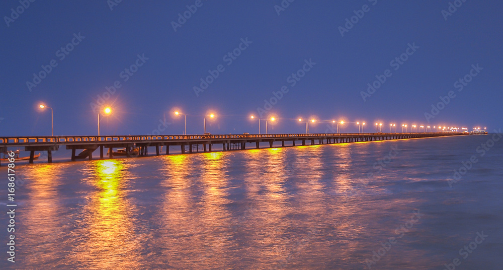 A long jetty with lights at the ocean near Trat, east Thailand. Ferries for Ko Kut leave from here.