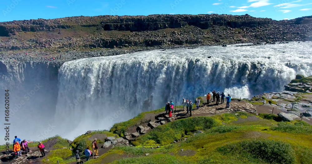 Fototapeta premium Dettifoss Waterfall with Hikers at Overlook - Islandia
